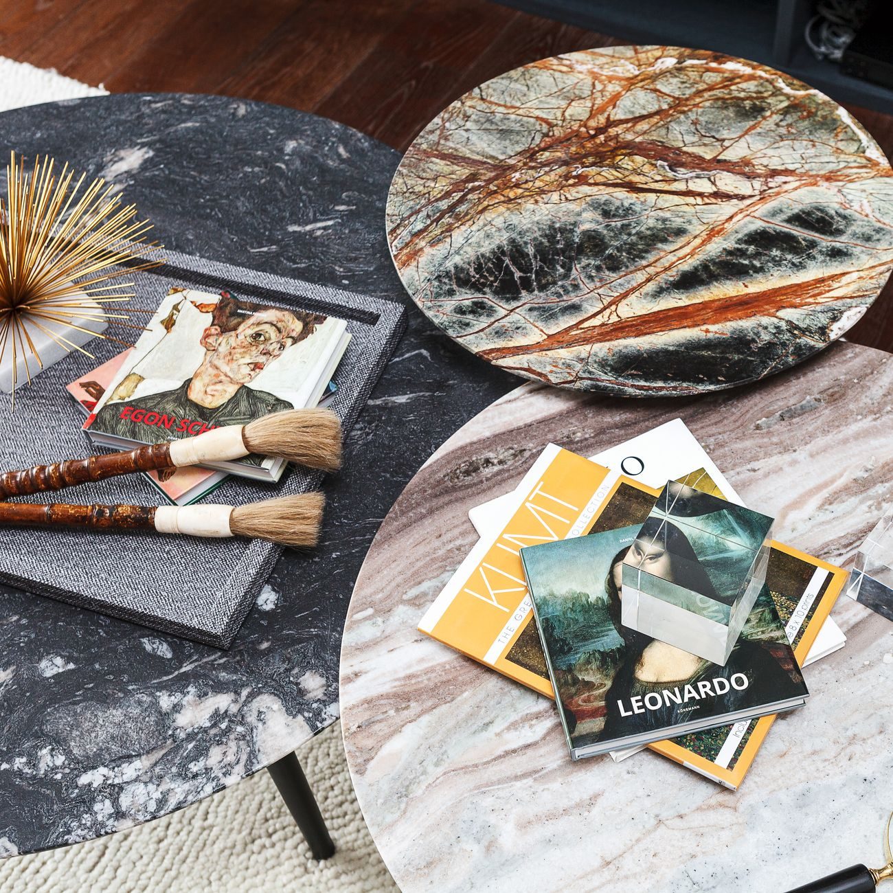 Nuna Studio marble coffee tables with art books